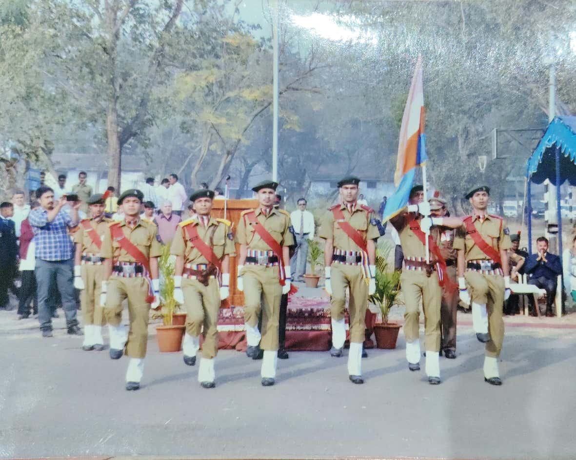 Cadets marching with flag